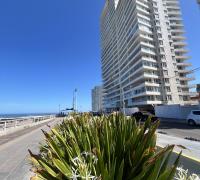 Edificio Península  , primera linea frente al mar.