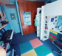 segundo dormitorio, también con clóset espacioso e iluminación y vista norte