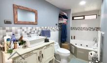 BAÑO DORMITORIO PRINCIPAL CON JACUZZI