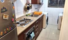 Cocina amoblada vista dos