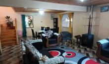 GRAN LIVING COMEDOR CON ESTUFA A LEÑA COMBUSTION LENTA
