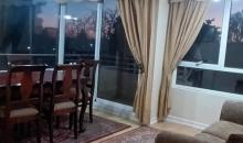 VISTA DE ELEGANTE LIVING COMEDOR AL ATARDECER