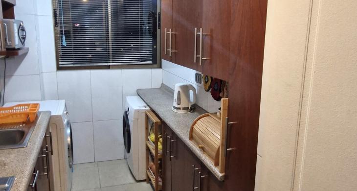 Cocina amoblada vista uno