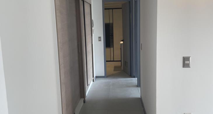 pasillo, que conduce a los dormitorios