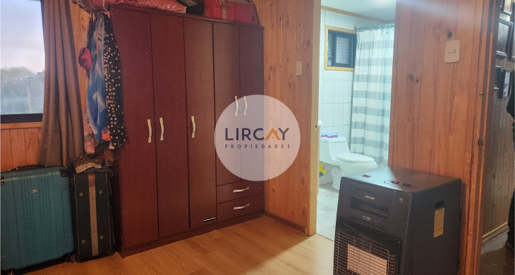 dormitorio principal con baño en suite